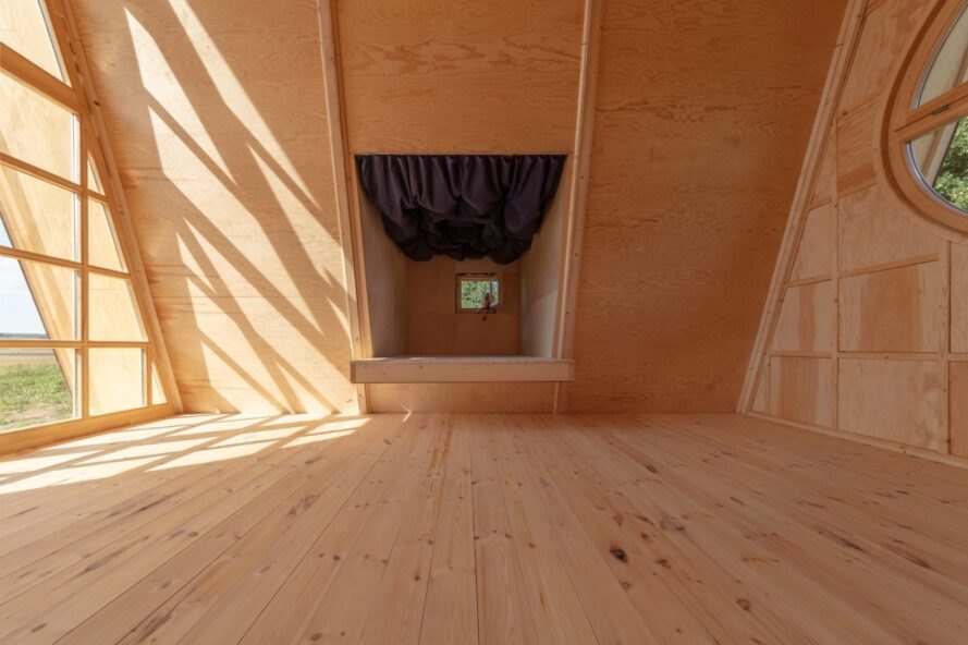 built-in sleeping loft inside tiny cabin
