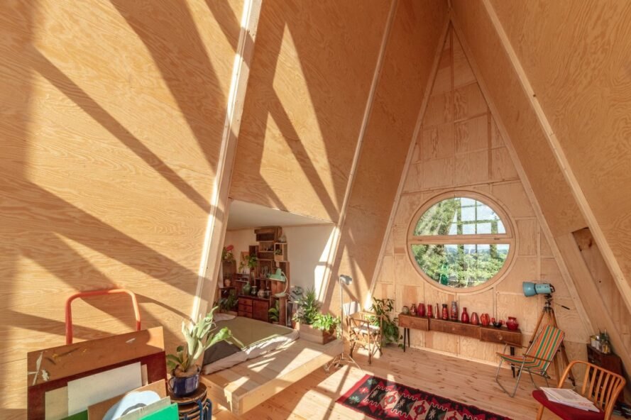 wood-lined interior of A-frame cabin