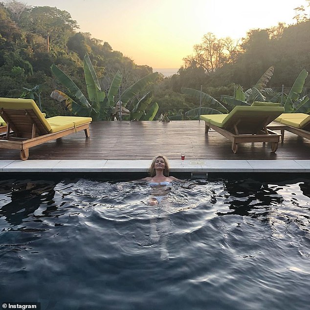 Rest and relaxation: Paulina has been posting several photos from her trip, including one of her lounging in a pool at a rental home called Villa Neruda