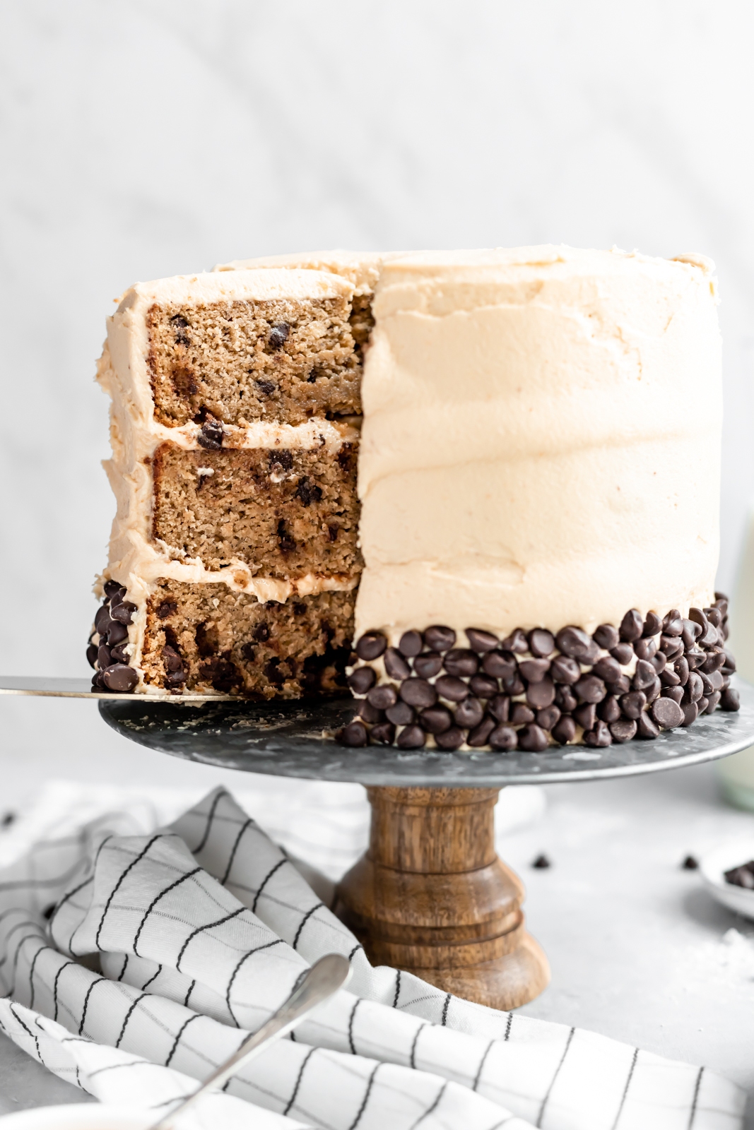 grain free peanut butter banana cake on a cake stand