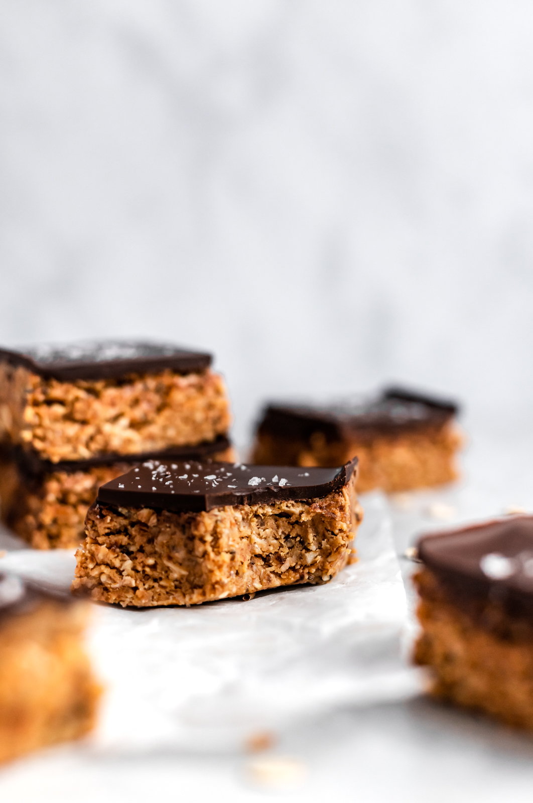 no bake chocolate peanut butter oatmeal bar with a bite taken out