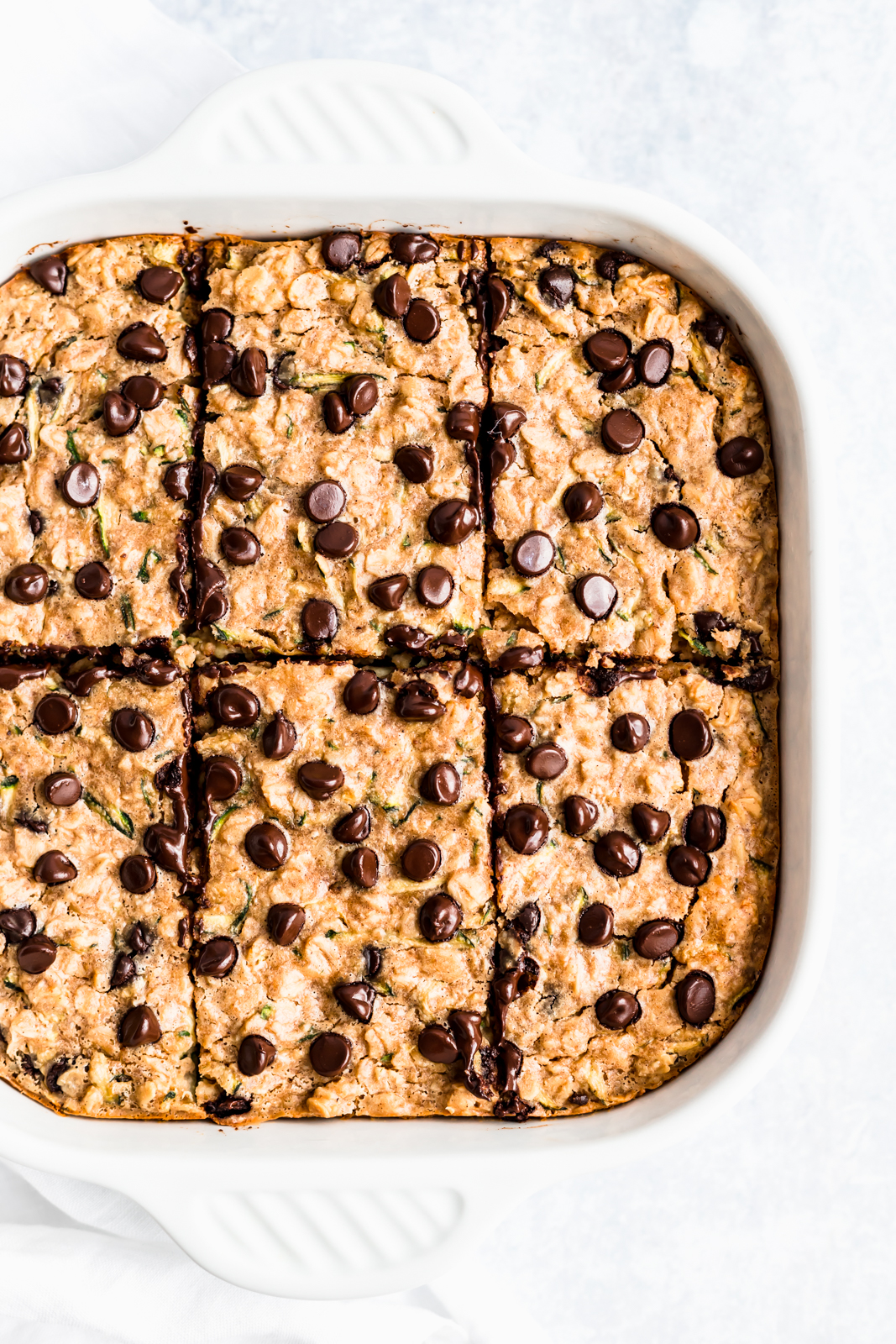 peanut butter zucchini bread baked oatmeal in a square baking dish