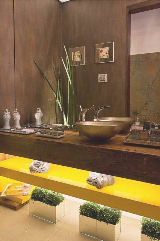 The other accent color is the furniture in the yellow, which is very hard in this double vanity, supported